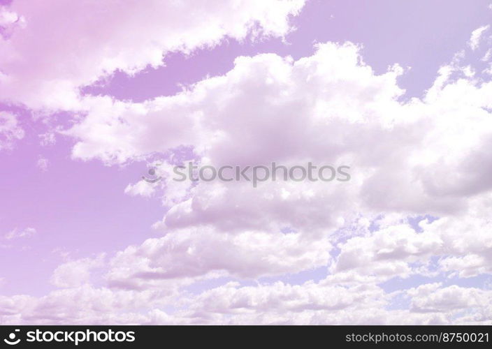 A blue sky with lots of white clouds of different sizes