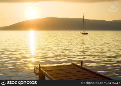 A boat dock in the Adriatic sea at sunset, Herceg Novi, Montenegro