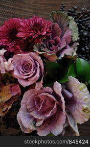 A bouquet of different type of purple flowers