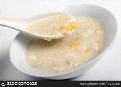 A bowl of chicken and sweetcorn soup, a favourite chinese dish.