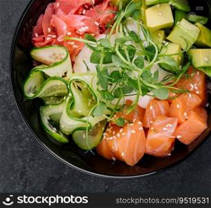 A bowl of salmon poke with avocado
