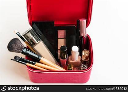 A box of various cosmetics and brushes isolated on white background, Top view, Beauty concept