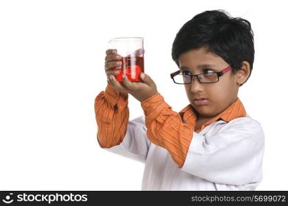 A boy dressed as a scientist