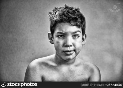 A boy looking skeptical in Black and White