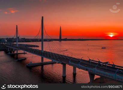 A bridge across the river. A large bridge in St. Petersburg.. bridge across the river. A large bridge in St. Petersburg.