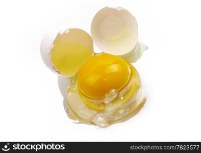 a broken egg on a white background isolated