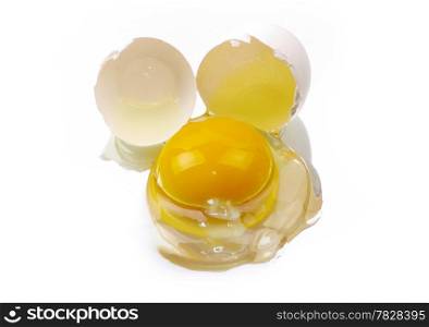 a broken egg on a white background isolated
