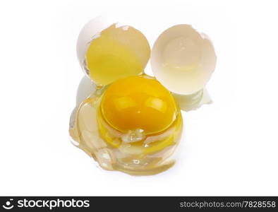 a broken egg on a white background isolated