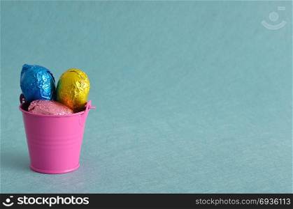 A bucket filled with easter eggs