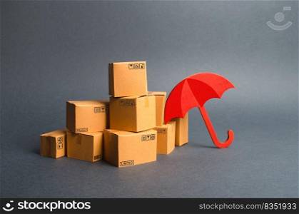 A bunch of cardboard boxes and umbrella. concept of insurance purchases. Providing warranty on purchased products. Consumer rights Protection. Support of the national manufacturer by government