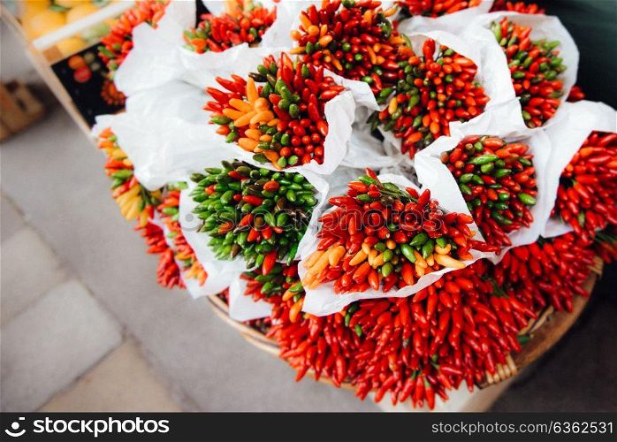 a bunch of crispy chili peppers on the market