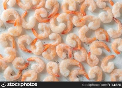 A bunch of frozen shrimp on the table