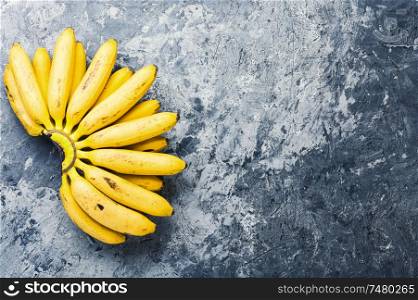 A bunch of ripe bananas.Space for text. Bunch of ripe yellow bananas