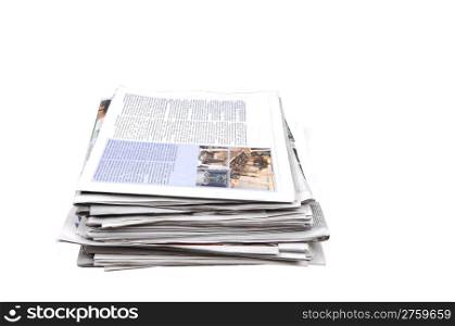 A bundle of old newspaper waiting to be recycled, for whitebackground.