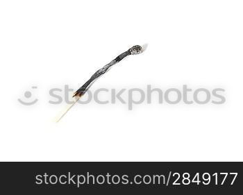 A burned match isolated on white