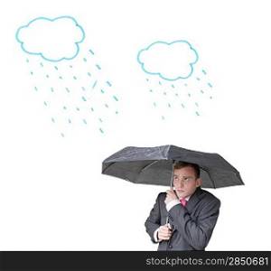 A business man hiding under an umbrella