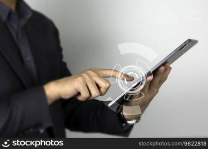 A business man&rsquo;s finger touching on precess screen of business work of technology design, and pointing on touch screen