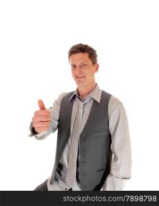A business man sitting in a grey shirt and vest making OK sign and smilingisolated for white background.