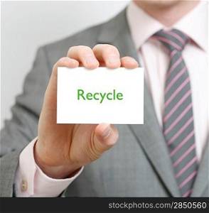 A business man telling you to recycle