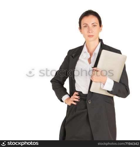 A business woman in a black suit holding on a computer notebook. Portrait on white background with studio light.