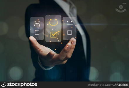 A business woman uses a customer rating service. In the service experience on the online application, the rating evaluates the concept of customer feedback. with rating icon