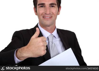 A businessman giving the thumb up.