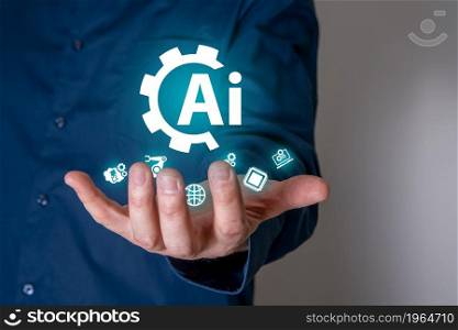 A businessman on a blurry background using a digital artificial intelligence icon. The concept of artificial intelligence of the future.. A businessman on a blurry background using a digital artificial intelligence icon.