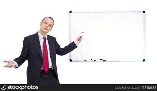 A businessman, pointing with a red marker towards a whiteboard - waiting for your message, just paste it in - plenty of copyspace available!