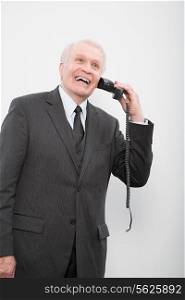 A businessman using a broken phone