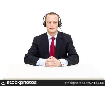 A businessman with a headset and microphone ready to take your call