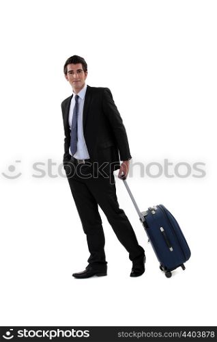 A businessman with his luggage.