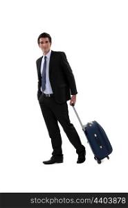 A businessman with his luggage.