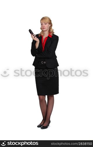 A businesswoman depressed after a phone conversation.