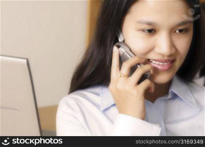 A businesswoman making a phone call