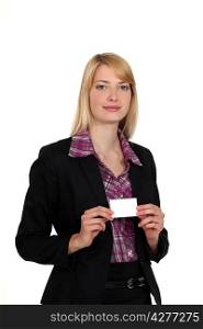 A businesswoman presenting her card.