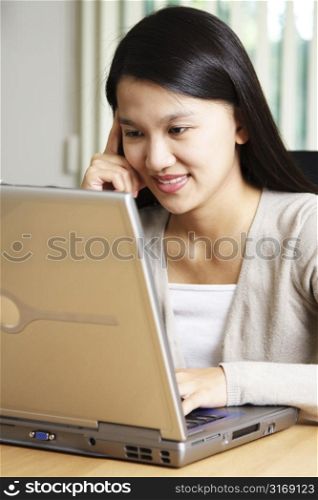 A businesswoman working on her laptop