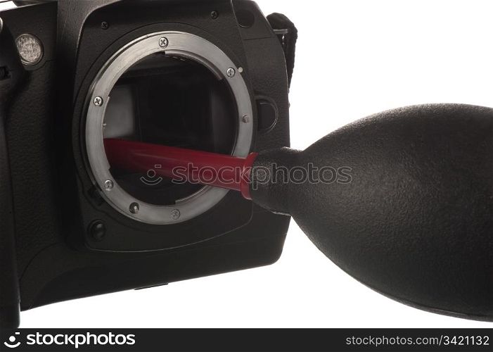 A camera and blower to clean the sensor