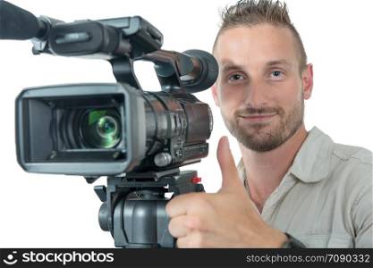 a cameraman with professional camcorder make OK sign isolated on white background