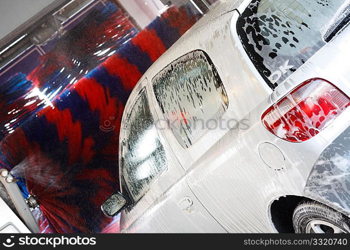 A car being washed in a car wash