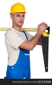 A carpenter with a handsaw.