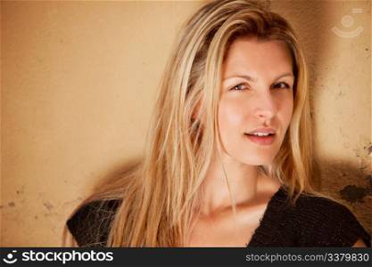 A casual street portrait of a happy attractive european woman