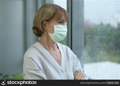 A caucasian senior woman wearing a mask, covid19 pandemic concept. Caucasian senior woman wearing a mask, covid19 pandemic concept