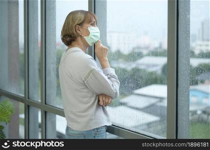 A caucasian senior woman wearing a mask, covid19 pandemic concept. Caucasian senior woman wearing a mask, covid19 pandemic concept