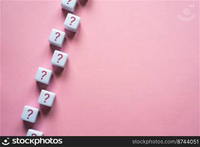 A chain of question marks on blocks. Questions and problem solving. Frequently asked Questions FAQ. Health and reproduction. Interesting information and unknown facts. Explanations.