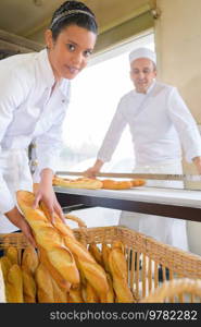 a cheerful female bakery workers