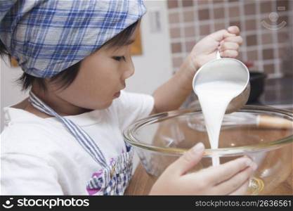a child cooking