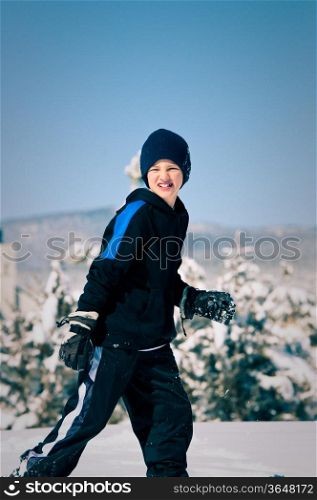 A child having fun in the snow.