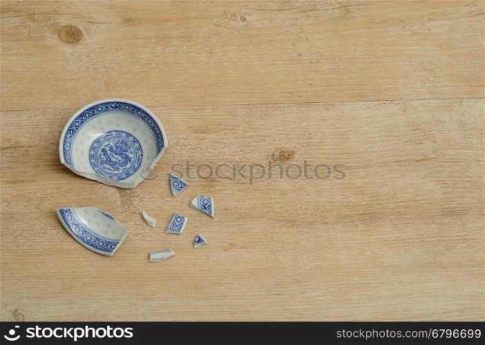 A Chinese bowl broken into pieces