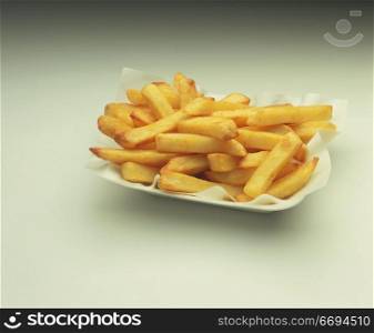 a chips/fries in a takeaway tray