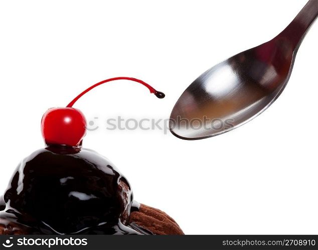 A chocolate covered sundae with a red cherry, ready to eat. Shot on white background.